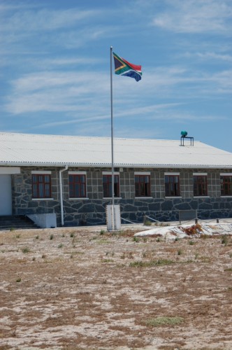New South African flag outside of the Robben Island Prison
